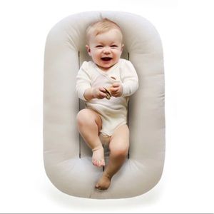 Snuggle me organic baby lounger and cover